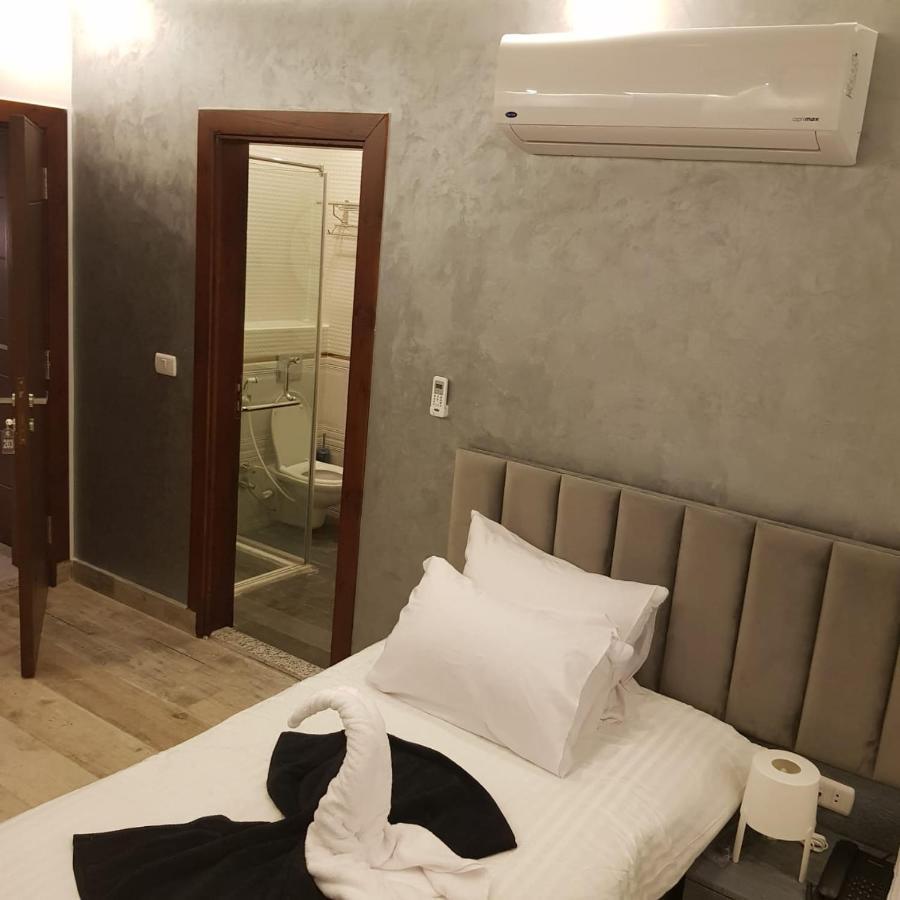 Cleopatra Pyramids View Hotel Kafret el-Gabal Exterior foto